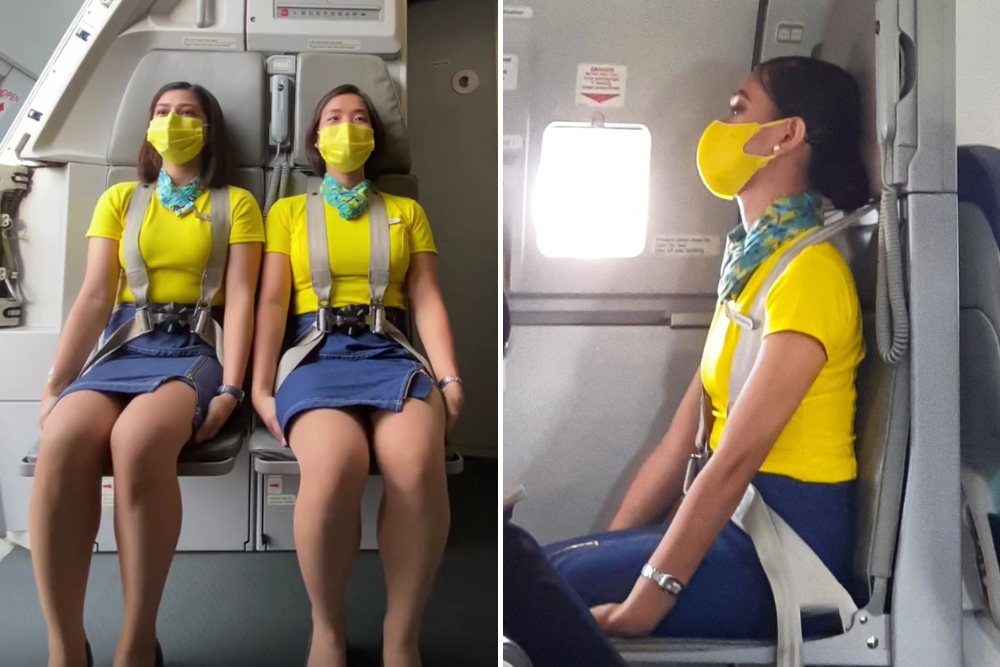 why do cabin crew sit on their hands during takeoff and landing 3